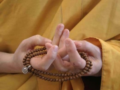 Mandala offering hand mudra.