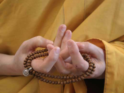 Mandala offering mudra.