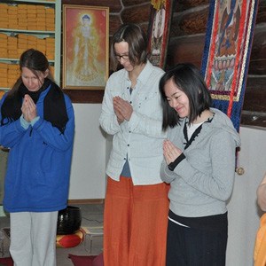 Abbey retreatants waiting for Venerable to arrive for a teaching.