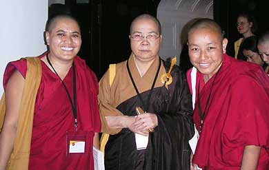 Venerable Wu Yin standing with two Tibetan nuns.