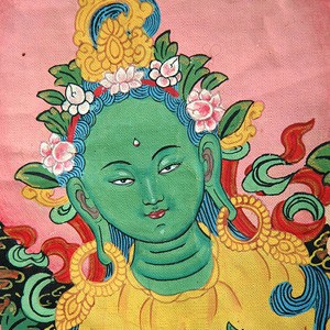 Closeup of Green Tara thangka.