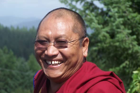 Geshe Kelsang Damdul, smiling.