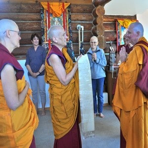 Ven. Thubten Tsultrim makes offerings to her preceptor Ven. Chodron after the ordination