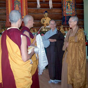 Abbey monastics and visiting monastics in the meditation hall.