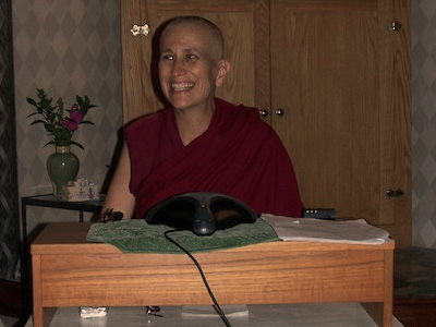 Venerable giving a talk during Medicine Buddha retreat.