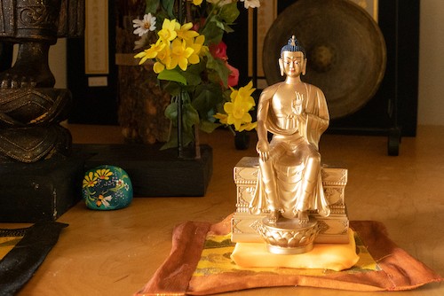 Golden statue of Maitreya bodhisattva.