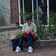 Abbey retreatant studying near the Meditation Hall.