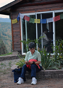 An Abbey retreatant studying near the Meditation Hall.