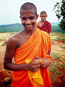 Two smiling Sri Lankan monks.