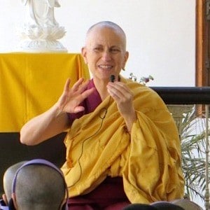 Venerable teaching and gesturing with her hand.