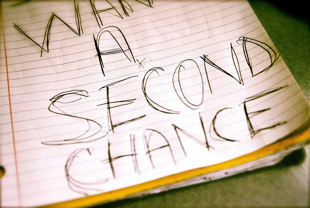 Big writing on a notebook page "what a second chance