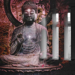 Statue of a buddha superimposed over prison bars.