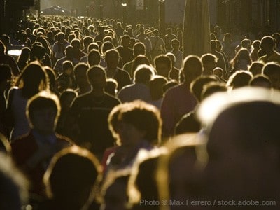 A crowd of people walking.