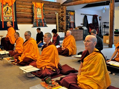 Monastics at the Abbey, chanting.