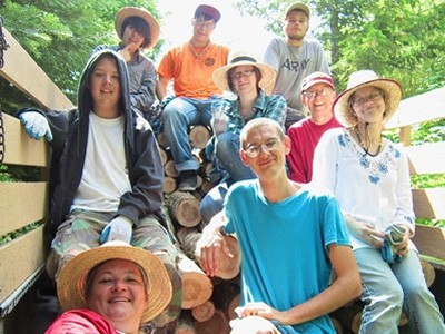 A group of smiling teens at the Abbey.