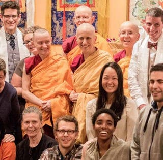 Group photo of retreatants from the Shantideva Meditation Center talk standing with Abbey nuns..