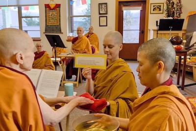 Abbey monastics performing varsa ceremony.