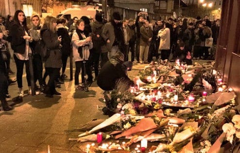 Group of people at candlelight vigil.