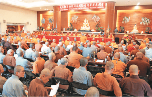 Room full of monastics present for the World Buddhist Bhikkhuni Association Signing Ceremony in 2016 in Taiwan.