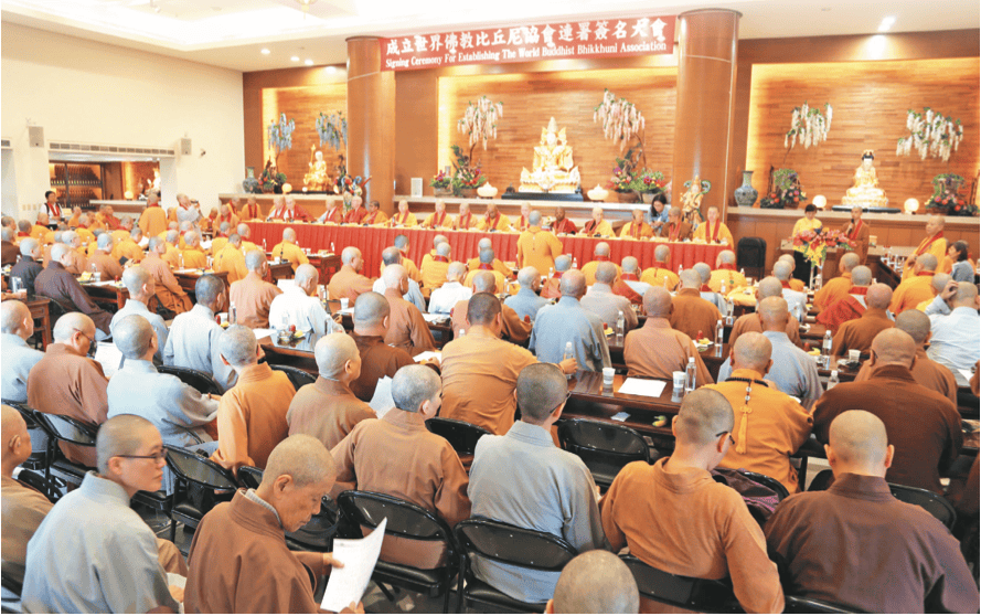 Room full of monastics present for the World Buddhist Bhikkhuni Association Signing Ceremony in 2016 in Taiwan.