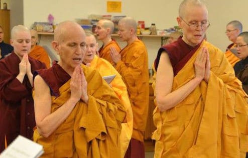 Ven. Chodron leading a group of monastics in a chant.