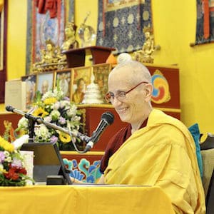 Ven. Chodron smiling and teaching in Russia.