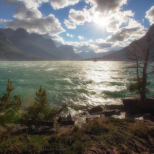 Large body of water with mountains in background.