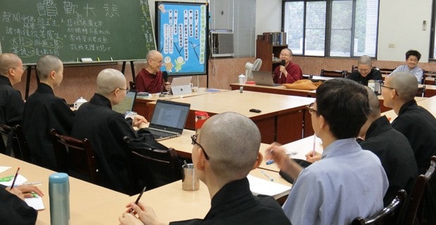 Venerable teaching to a group of nuns.