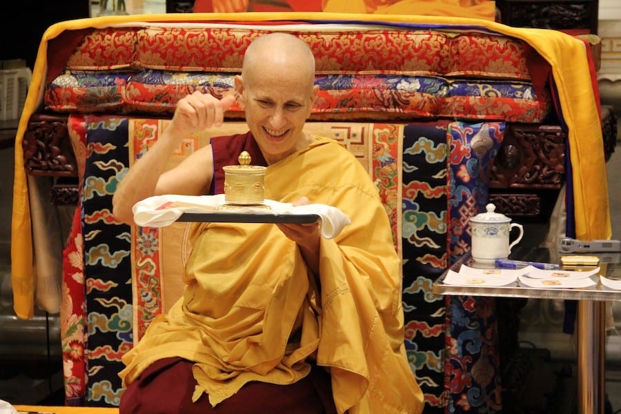 Venerable Chodron spins a mani wheel.