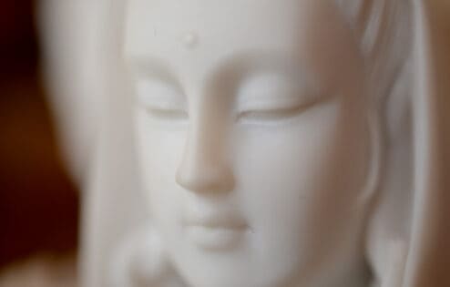 Closeup of the face of Kwan Yin.