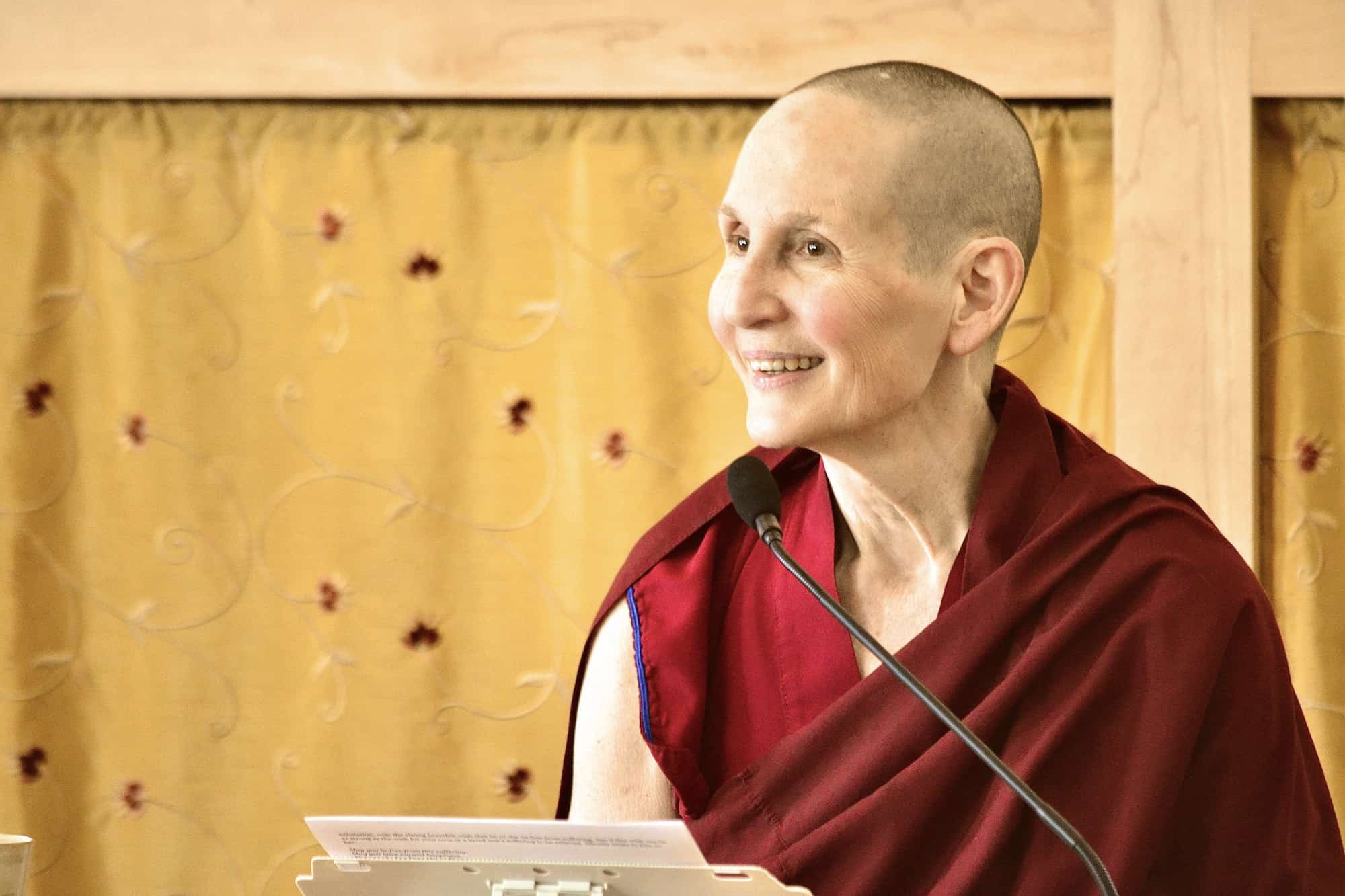 Ven. Tsepal smiling while teaching.
