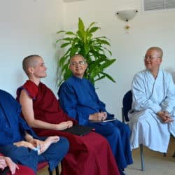 Abbey trainees have a discussion with nuns from the Tibetan and Chinese traditions.