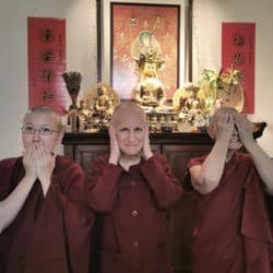 Venerables Chodron, Chonyi, and Damcho recreate "See no evil, hear no evil, speak no evil."