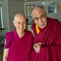 Venerable Chodron next to His Holiness the Dalai Lama.