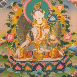 Thangka of White Tara with right hand outstretched and left hand holding a lotus.