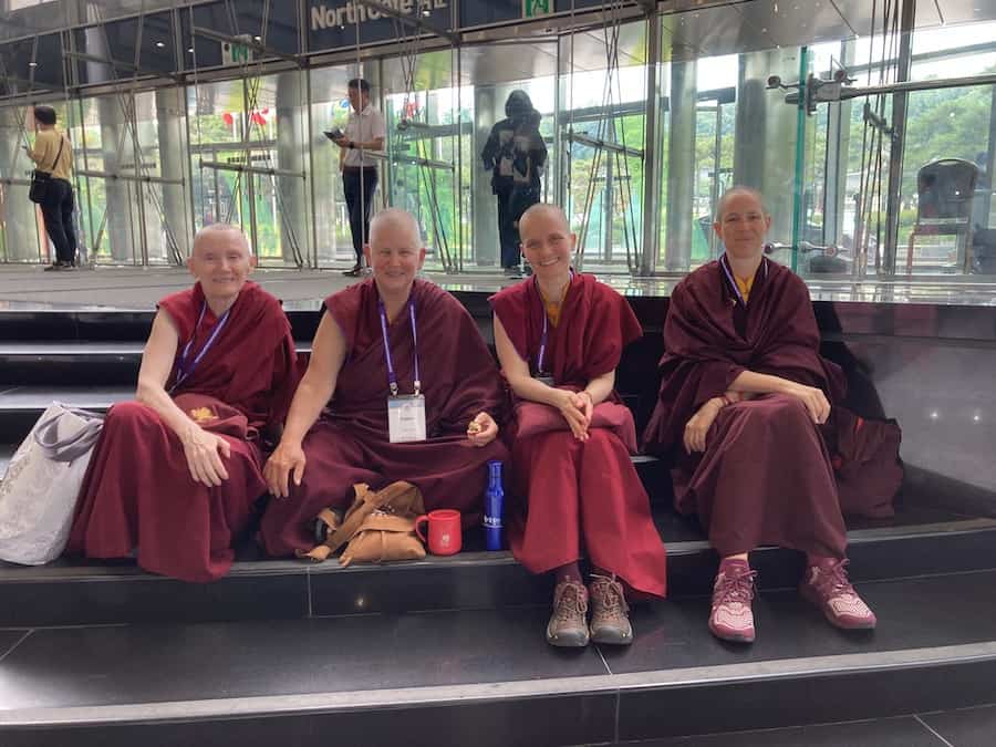 Four buddhist nuns from the Tibetan tradition attend the Sakyadhita Conference.